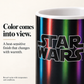 Close-up of the multicolor print revealed on a warmed ceramic mug.